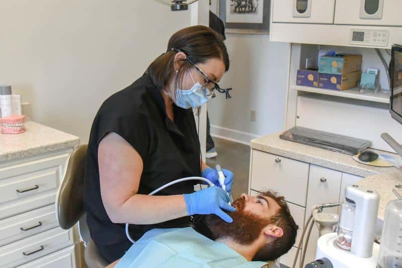 Eddleman Dental team member working on dental patient