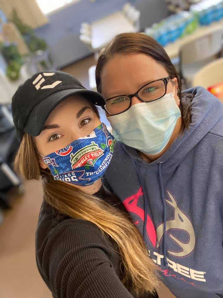 northeast louisiana food bank two girls smiling with masks on