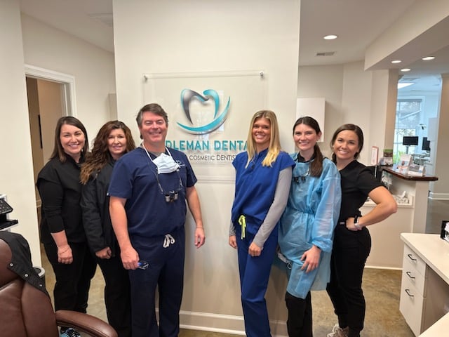 eddleman dental team smiling in office